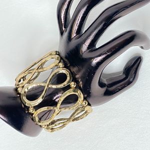 Stretch Bracelet Gold Tone Hammered Infinity And Little Ball Links